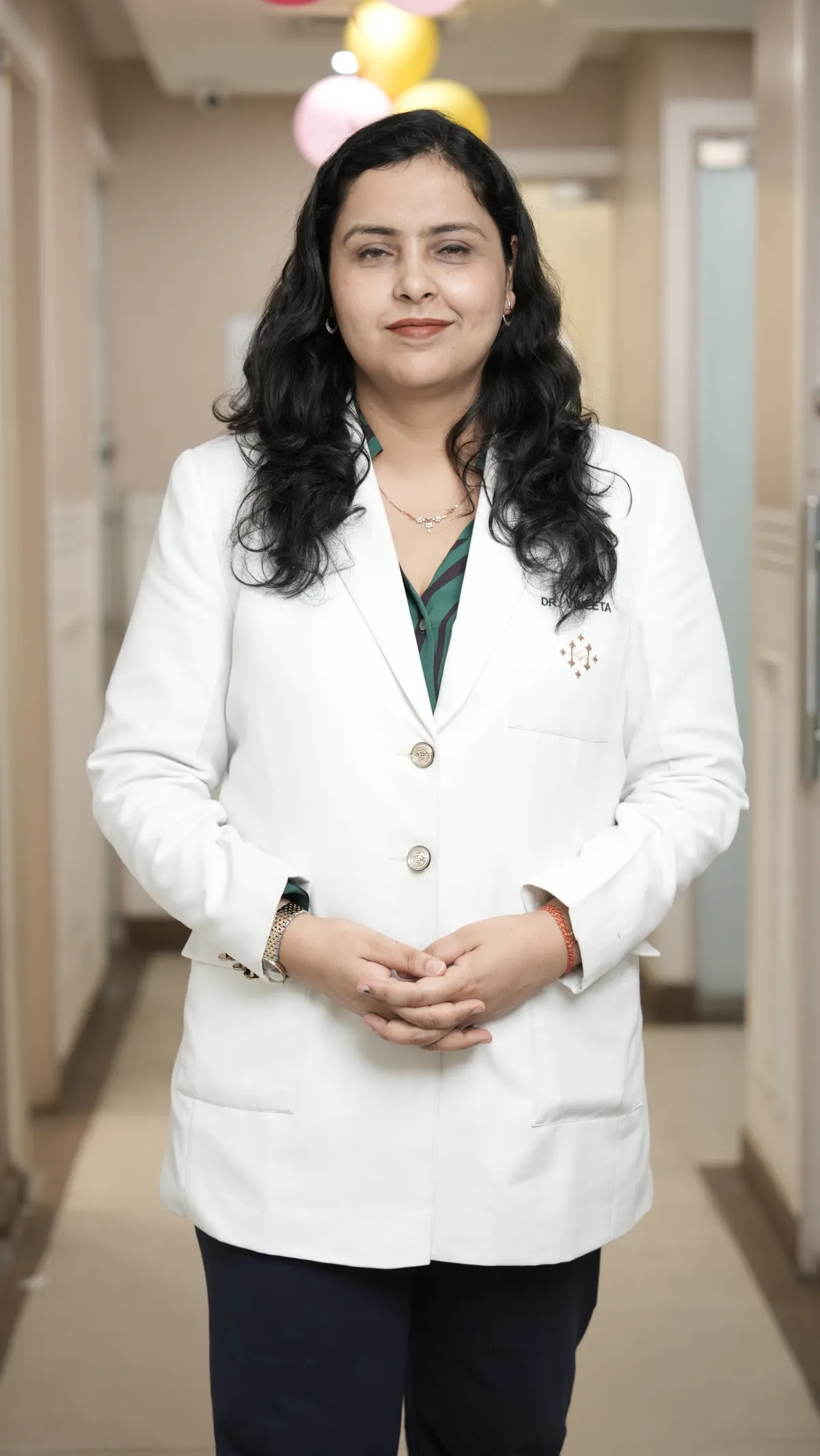 Physician assessing a patient's face during an aesthetic consultation