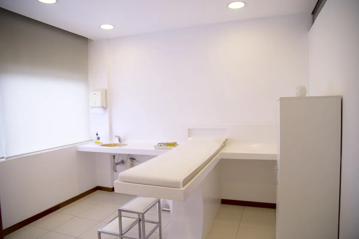 Modern aesthetic medicine treatment room prepared for a patient