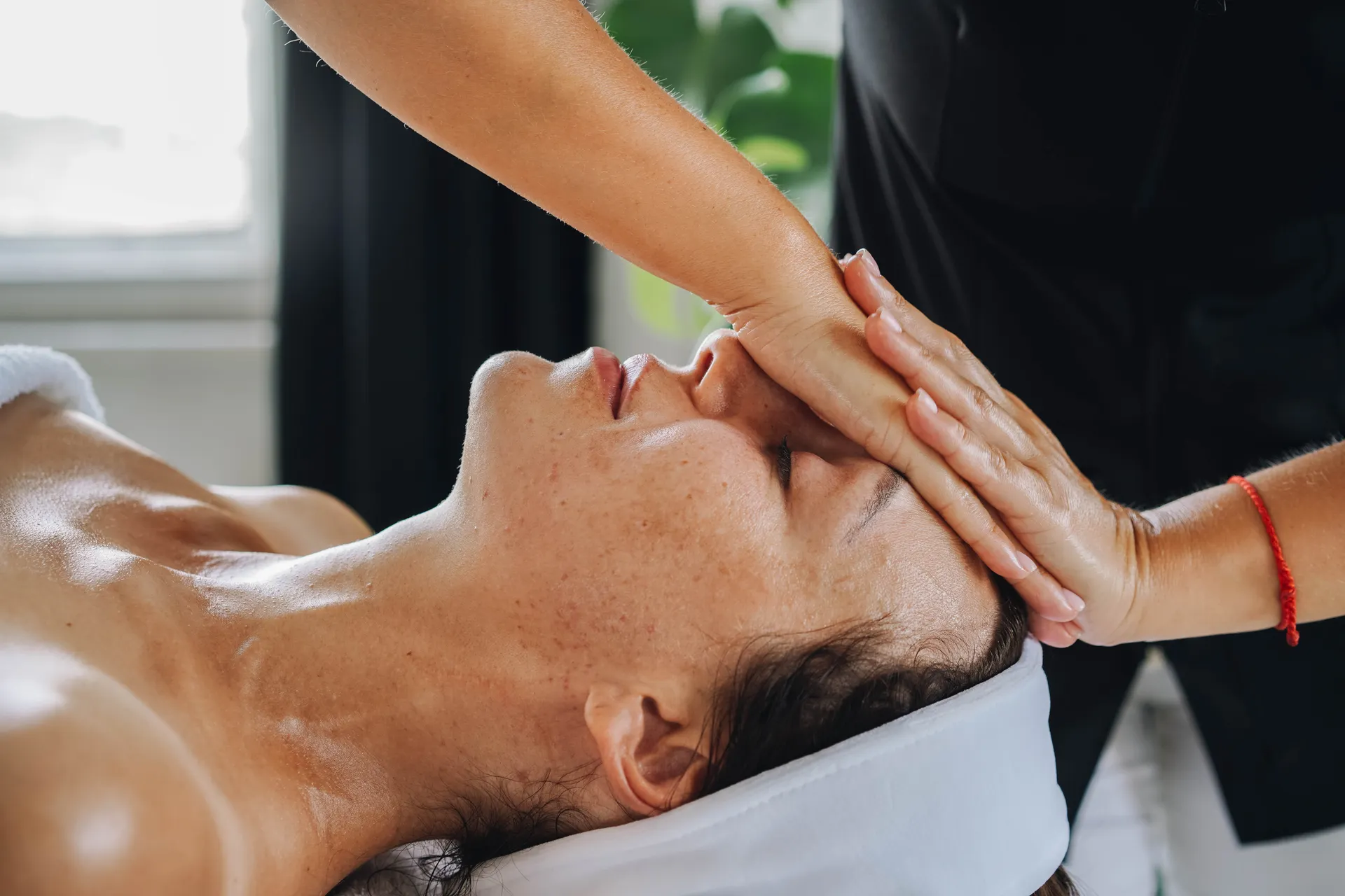 Client receiving a facial treatment at a premium med spa